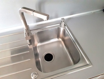 Kulaté pneutlačítko k zapínání drtičů odpadu EcoMaster, lesklý chrom